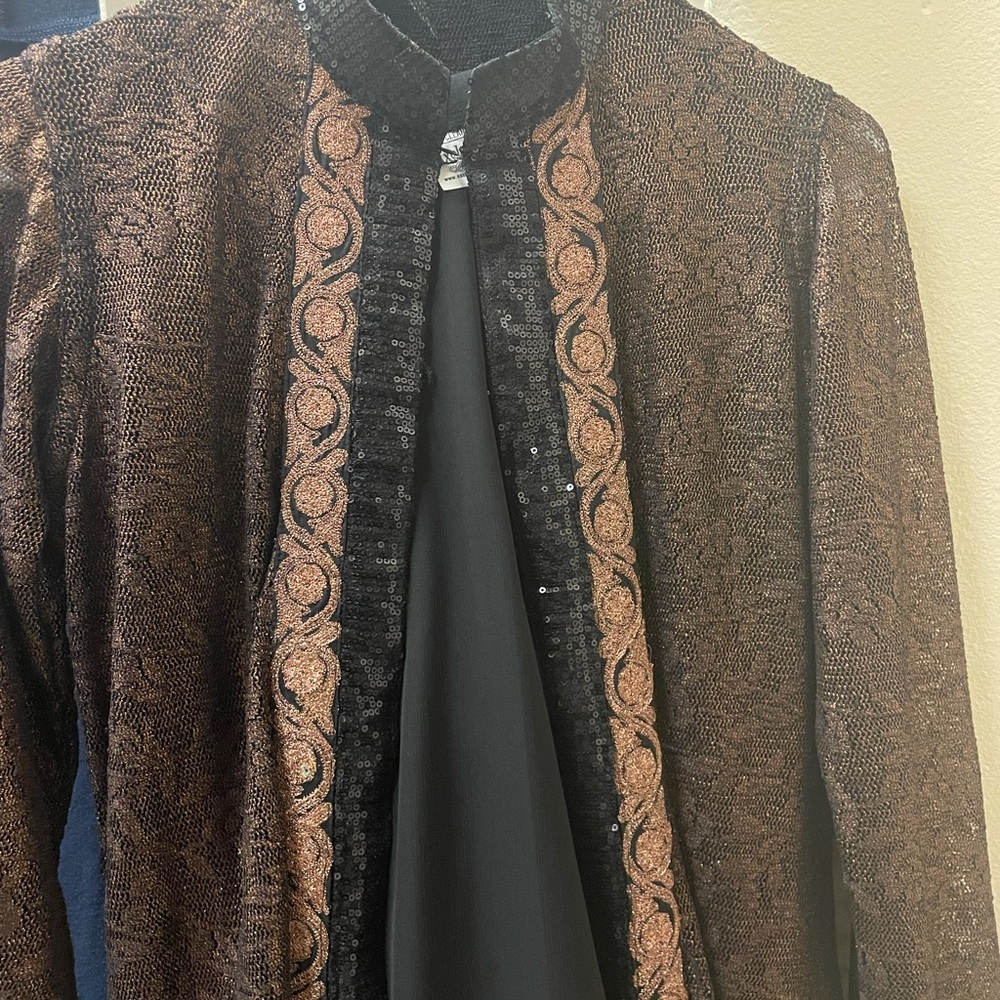 Exclusive brand new condition outer coat brown inside black